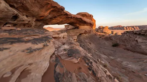 Numerous rock arches adorn both the core and periphery of the desert within the Hisma Desert, located in Tabuk region